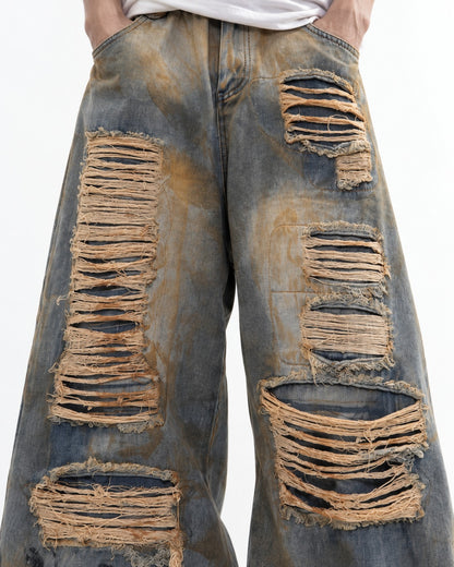Heavily Distressed Wide-Leg Denim Pants