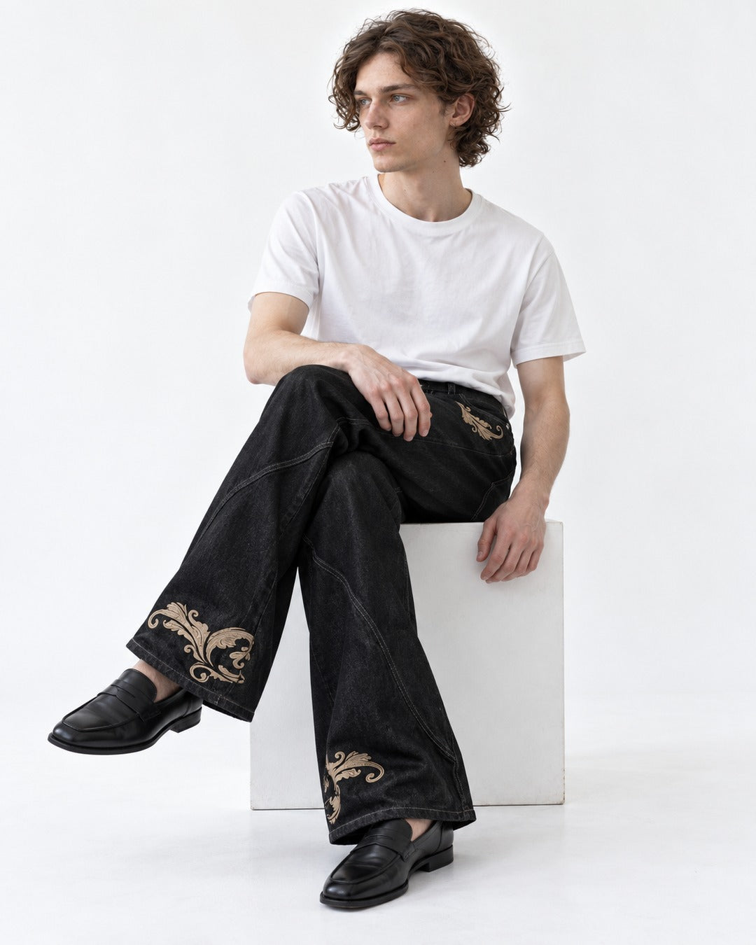 Flared Jeans with Embroidered Hem