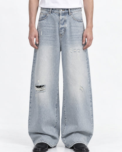 Distressed Wide-Leg Jeans With Raw Hem