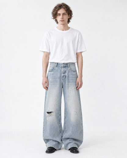 Distressed Wide-Leg Jeans With Raw Hem