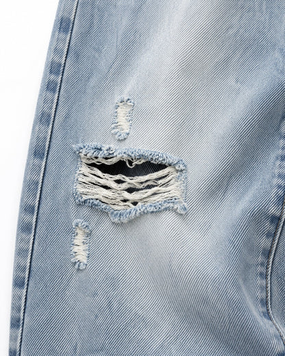 Distressed Wide-Leg Jeans With Raw Hem
